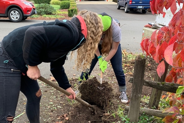 Westside Christian Students helping neighbors with yard work